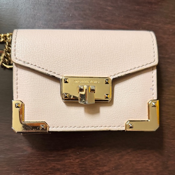 Michael Kors Handbags - NWOT Michael Kors Pale Pink Leather Mini Wallet with Gold Hardware